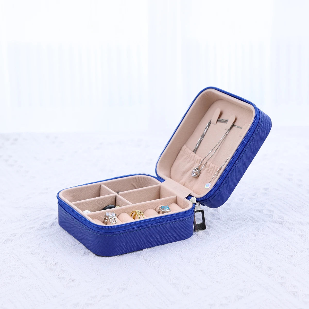 A portable organizer for travel jewelry boxes, storage bags, rings, earrings, necklaces, and bracelets - the perfect gift for women