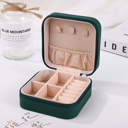 A portable organizer for travel jewelry boxes, storage bags, rings, earrings, necklaces, and bracelets - the perfect gift for women