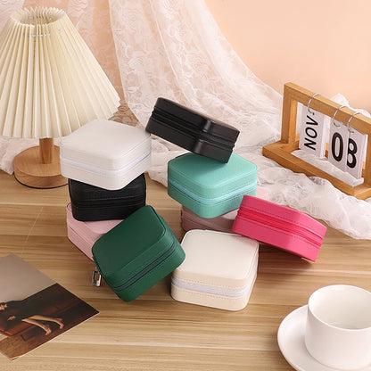 A portable organizer for travel jewelry boxes, storage bags, rings, earrings, necklaces, and bracelets - the perfect gift for women