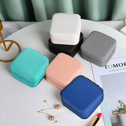 A portable organizer for travel jewelry boxes, storage bags, rings, earrings, necklaces, and bracelets - the perfect gift for women