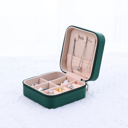 A portable organizer for travel jewelry boxes, storage bags, rings, earrings, necklaces, and bracelets - the perfect gift for women