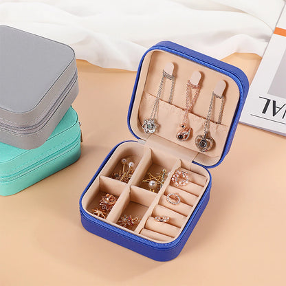 A portable organizer for travel jewelry boxes, storage bags, rings, earrings, necklaces, and bracelets - the perfect gift for women