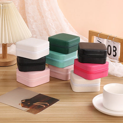 A portable organizer for travel jewelry boxes, storage bags, rings, earrings, necklaces, and bracelets - the perfect gift for women